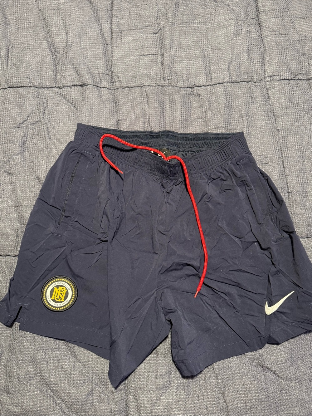 Nike Men’s Navy Athletic Shorts with Red Drawcord and White Swoosh